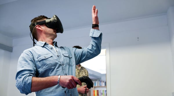 person wearing virtual reality headset experiencing design