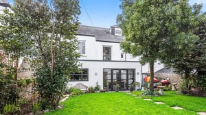 View of a contemporary rear extension from the back of a listed building