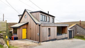 External image of converted bungalow with timber cladding