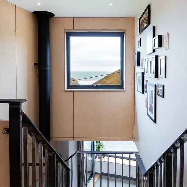 View out of dormer towards beach