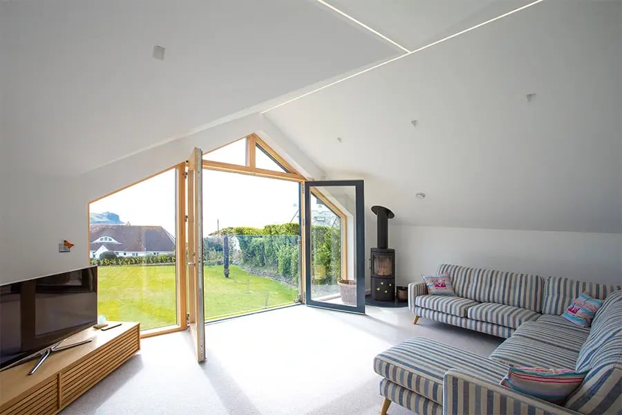 sitting room with open double doors to garden