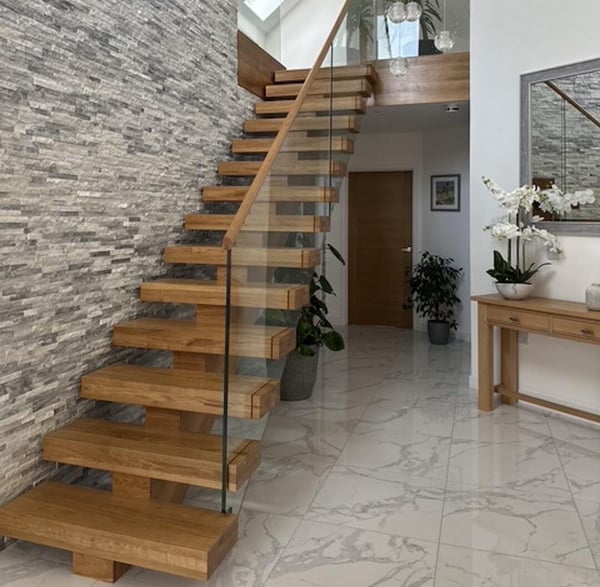 floating wooden stair with glass guarding