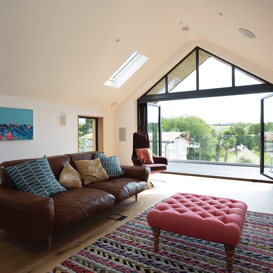 view from living room over balcony towards Cornish countryside