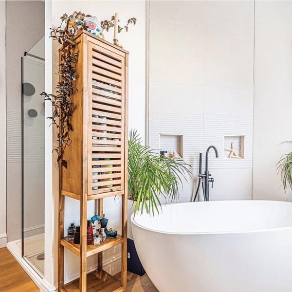 free standing bath surrounded in plants