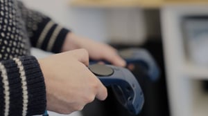 Image of someone holding VR controllers