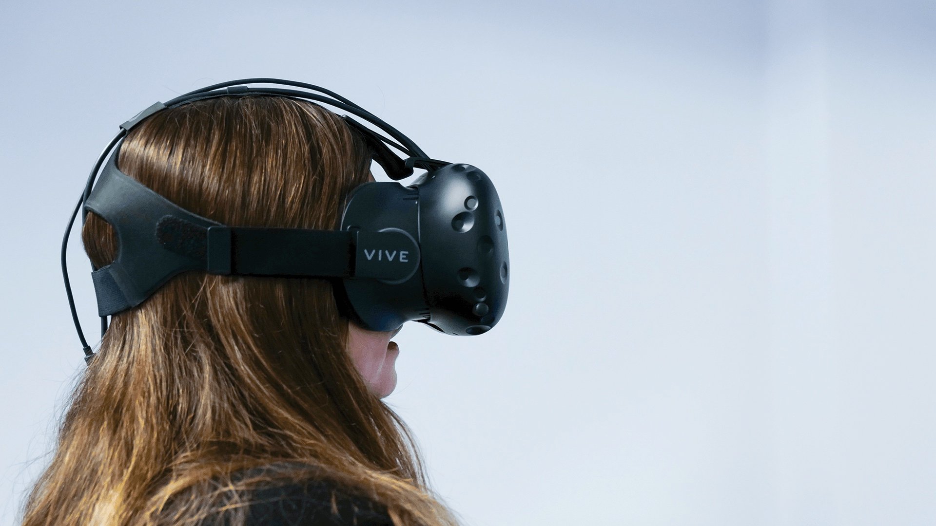 close up of someone wearing virtual reality goggles close up of someone wearing virtual reality goggles