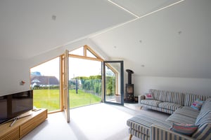 Light, airy lounge in a new build home in St Mawes, Cornwall