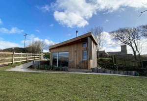 wooden building in garden